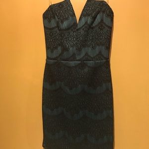 Emerald dress with black scallop lace